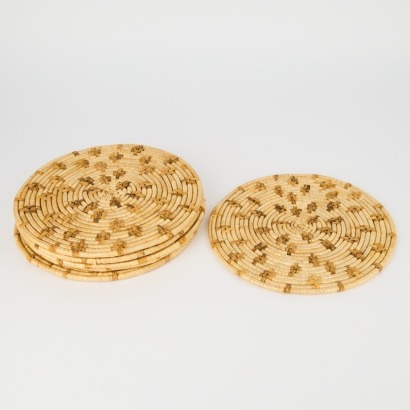 A Set of Six Round Woven Placemats