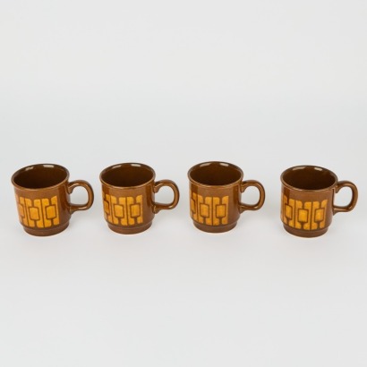 A Set of Four Crown Lynn Mugs