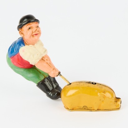 A Vintage Japanese Wind-Up Top of A Man & A Pig