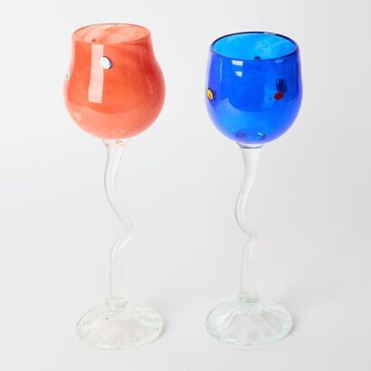 A Pair of Red and Blue Venus Hot Glass Wine Glasses, New Zealand