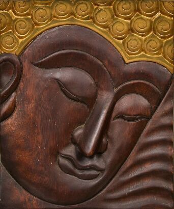 A Wooden Carved Buddha Wall Hanging