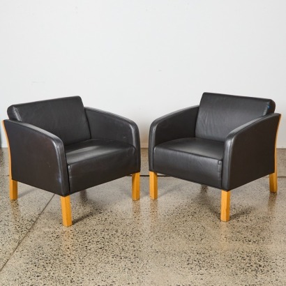 A Pair of Modern Lounge Chairs With Oak Frame