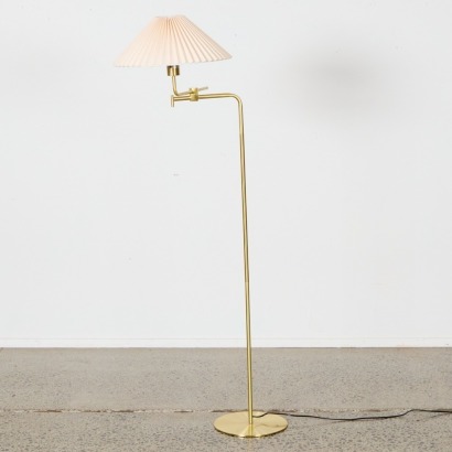 A Gold Articulated Floor Standing Lamp