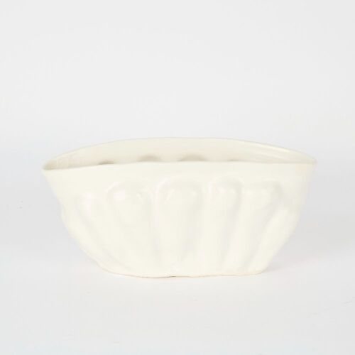A Glazed White Clay Ribbed Vase By Dryburgh Pottery
