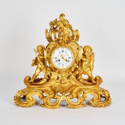 An Exceptional Quality French 19th Century Reclining Cherub Clock of Paliatial Proportions of Bronze with 24 Carat Gold Gilding