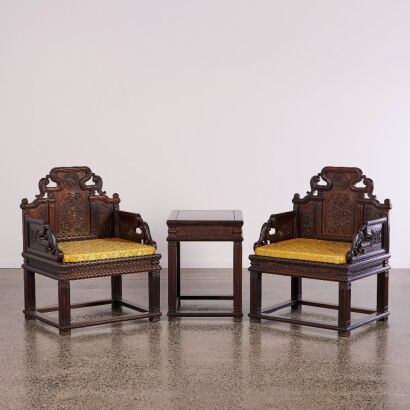 A Set of Chinese Zitan Carved Master's Armchairs and Tea Table