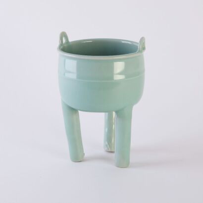 A Chinese Qing Dynasty Celadon Handled Tripod Incense Burner