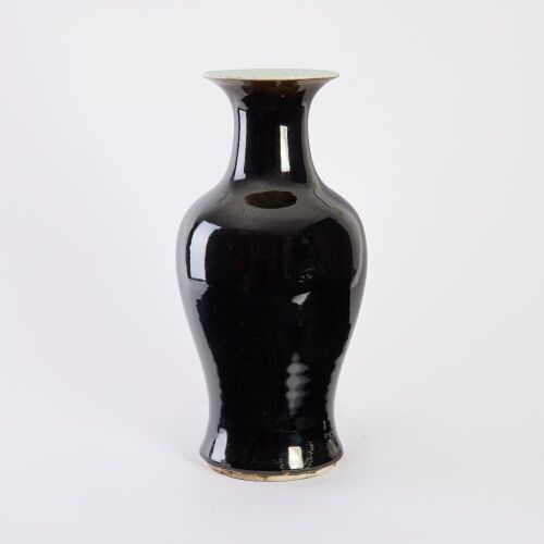 A Chinese Early Qing Kangxi Period Wujin Black-glazed Guanyin Vase
