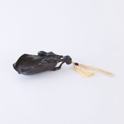 A Chinese Carved Zitan Magnolia Blossom Ornament