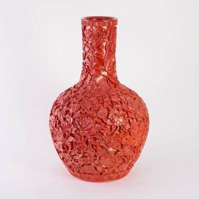 A Chinese Carved Red-glazed Porcelain &lsquo;Floral&rsquo; Tianqiuping (Qianlong Year Mark)