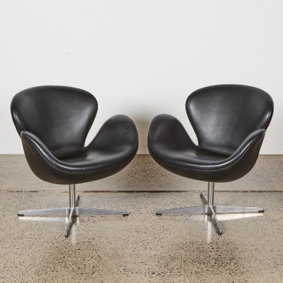 A Pair of Black Leather Reproduction Swan Chairs by Arne Jacobson