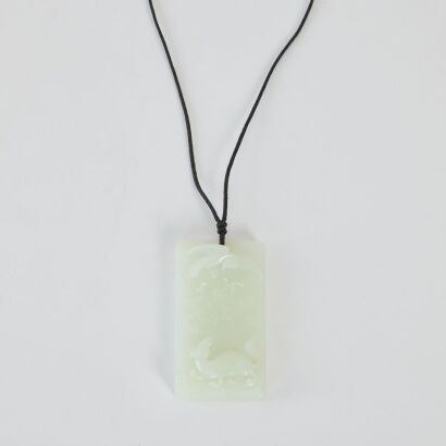 A Chinese White Jade Carved &lsquo;Flower and Bird&rsquo; Pendant
