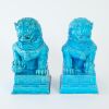 A Pair of Chinese Mid 20th Century Blue-glazed Lion Ornaments