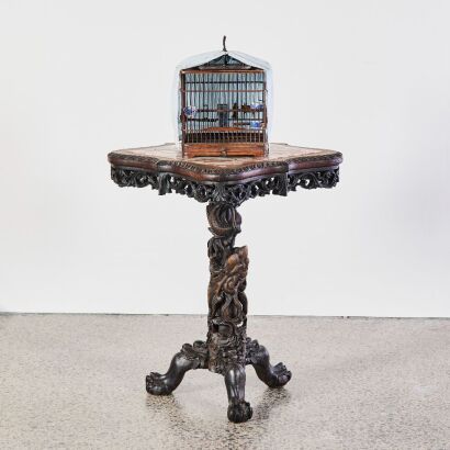 A Chinese Qing Dynasty Square &lsquo;Hongmu&rsquo; Birdcage and A Chinese Qing Dynasty Carved &lsquo;Hongmu&rsquo; &lsquo;Dragon&rsquo; Side Table