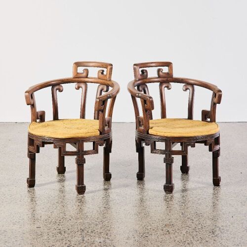 A Pair of Chinese Hardwood Horseshoe-back Armchairs