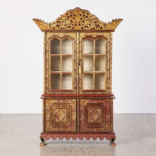 An Oriental Red Lacquer and Gilt Carved Decorative Cabinet