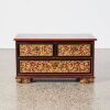 A Chinese Qing Dynasty Red Lacquer and Gilt Carved Panel Tea Table