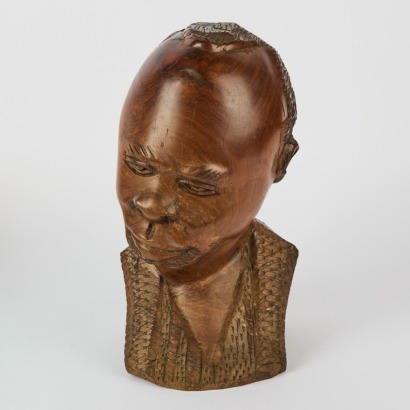 A Hand-Carved Solid Bust of a Man