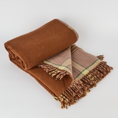 An Onehunga Tiki Label Travel Rug