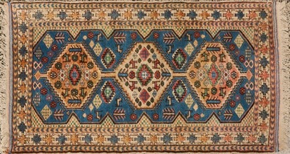 A Rug with Goat Design