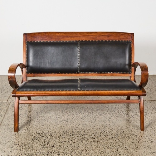 A Teak & Black Leather Mid Century Couch