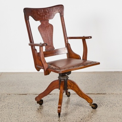 An Antique Oak Captains Swivel Chair