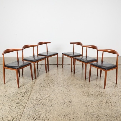 A Set of Six Wood Look Aluminium Framed Wishbone Style Chairs