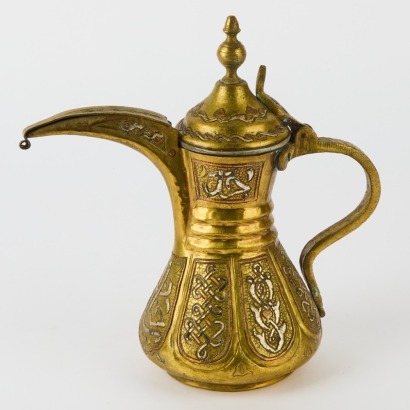 A Saudi Arabian Bedouin Copper Alloy Lidded Jug