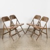 A Set of Four Lyon Aurora Machine Age Folding Metal Chairs