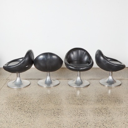 A Set of Four Mid-Century Swivel Tub Chairs