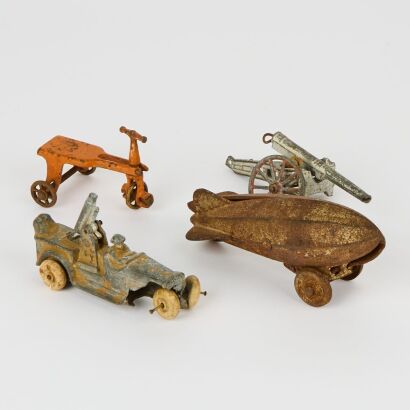 A Set of Four Antique Vehicles by Grey Iron Casting Company USA