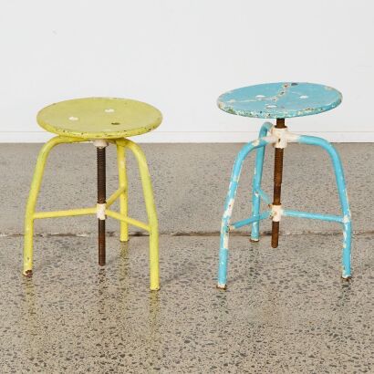 A Pair of Rustic Swivel Stools