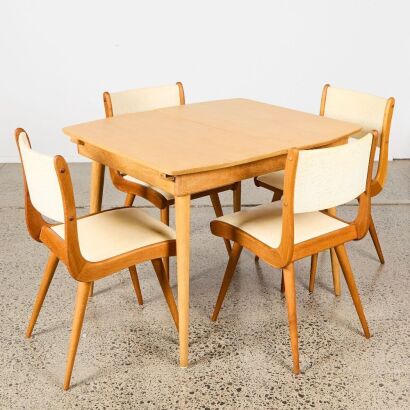 A Mid-Century Four Seater Oak Dining and Four Vinyl Seats