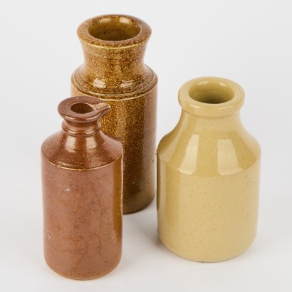 A Trio of Small Earthenware Bottles