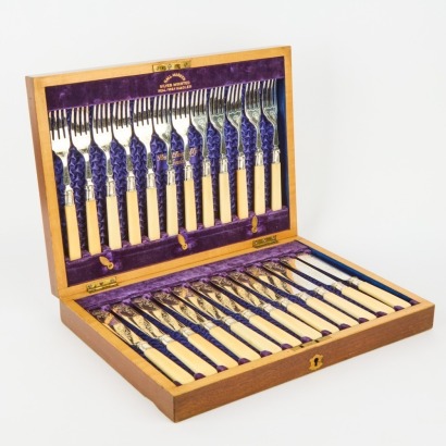 A 12 Setting of Stewart Dawsons & Co Silver Mounted With Ivory Handles