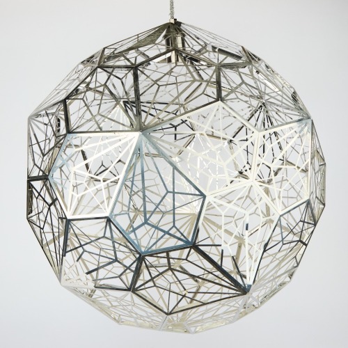 An Etch Web Pendant by Tom Dixon
