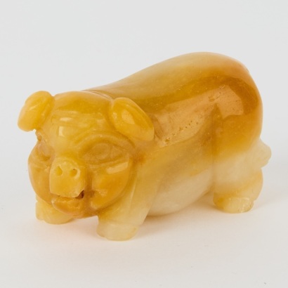 A Chinese Jade Pig-form Ornament