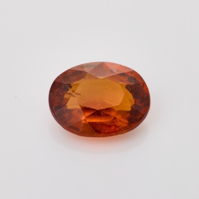Loose, 4.69ct Oval Mixed Cut Hessonite Garnet