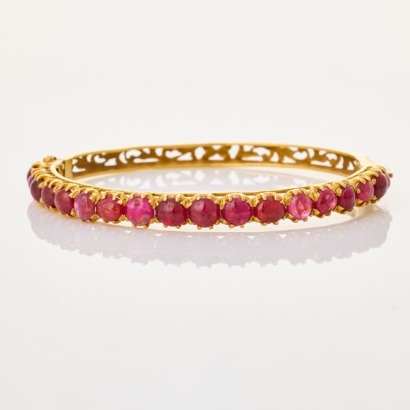 19 - 20ct Yellow Gold, 9.00ct Ruby-Set Hinged Oval Bangle