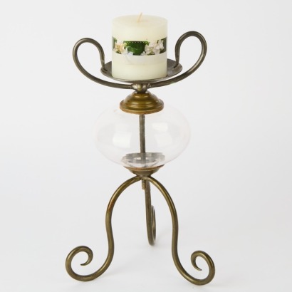 A Decorative Metal and Glass Tripod Candle Stand