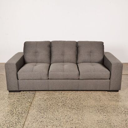 A Modern Three Seater Sofa in Charcoal Grey Fabric