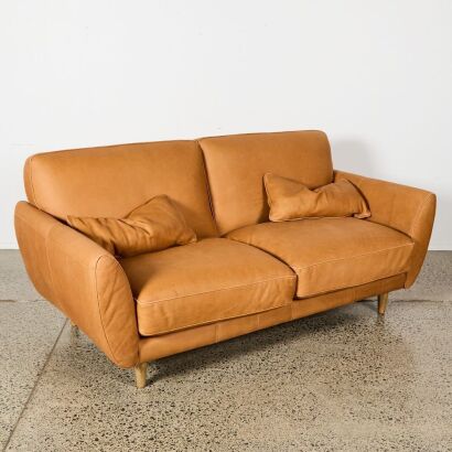 A Genuine Tan Leather Two Seater Couch