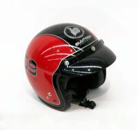 Ginger Molloy’s contemporary ‘Bultaco Helmets’ open face racing helmet in red and black livery.