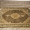 A Handknotted Tabriz Rug