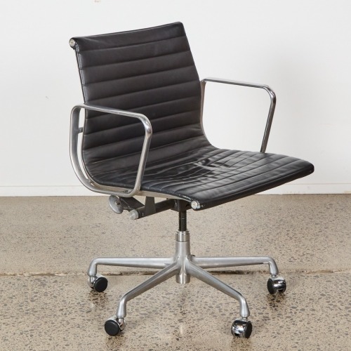 An Eames Aluminium EA335 Group Chair