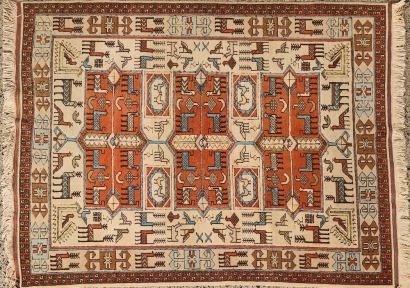 A Rug with Deer and Bird Design