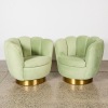 A Pair of Mirage Velvet Swivel Chairs by Eichholtz