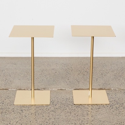 A Pair Of Gold Metal Side Tables