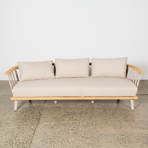 An Indoor/Outdoor Curve Back 3-Seater Couch
