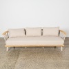 An Indoor/Outdoor Curve Back 3-Seater Couch